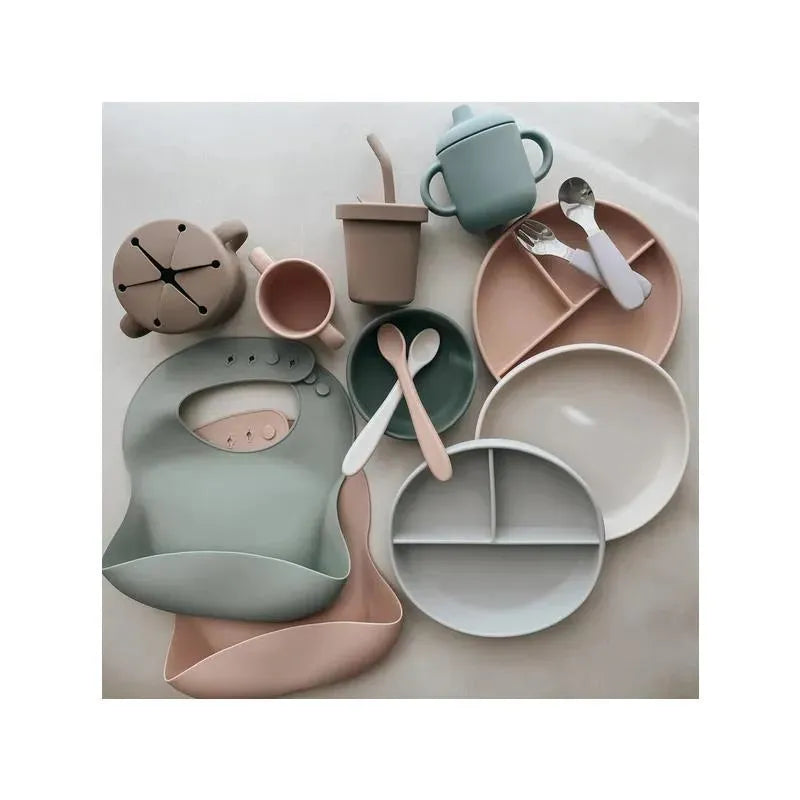 Suction bowl set in Lily Blue featuring assorted plates, cups, spoons, and a bib in soft pastel colors.