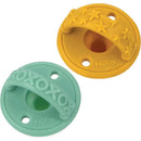 Two Nuby 3D silicone pacifiers in yellow and green, with textured handles and hole details, designed for infants 0M+.