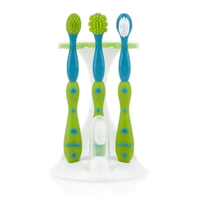 Five-piece Nuby Tooth & Gumcare Kit with colorful toothbrushes designed for children, featuring varying brush head styles.