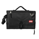 Black portable changing pad with a zippered closure, handle, and adjustable strap, featuring a Nuby logo.