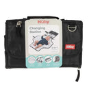 Portable changing pad in black with case, featuring a smiling baby on a patterned surface and Nuby branding.