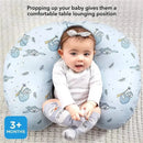 Nuby Dr. Talbots Nursing Pillow Cover in Jungle design, featuring a baby propped comfortably with playful sloth illustrations.