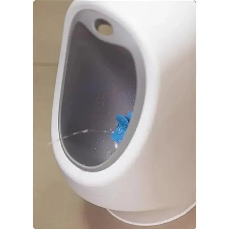 Nuby My Real Urinal Training Toilet with a blue target and water stream, designed for toddler potty training.