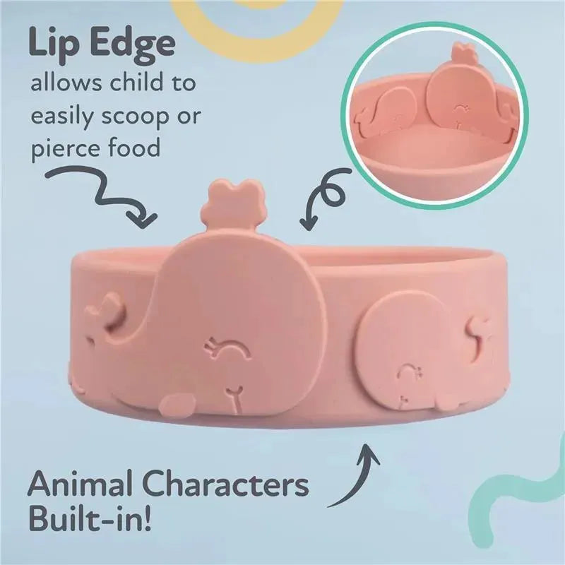 Silicone whale-shaped baby feeding bowl in pink blush with a decorative lip edge and built-in animal characters.