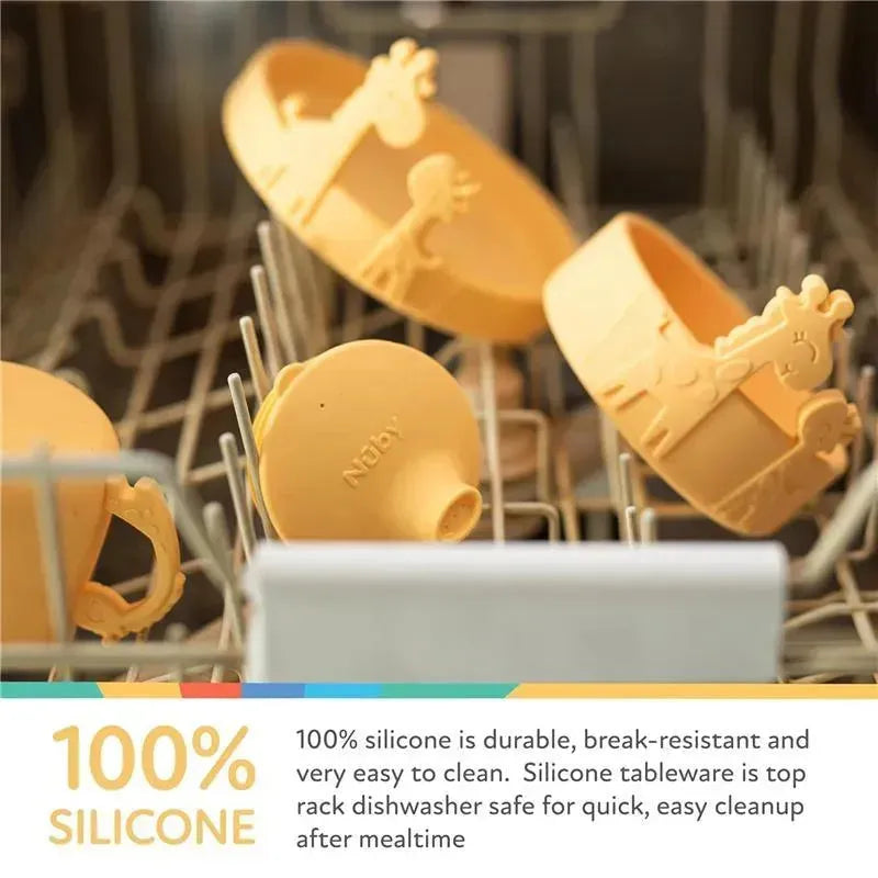Silicone whale-shaped baby feeding bowl in pink blush resting in a dishwasher, showcasing its durability and easy cleaning.