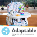 Floral-print water-resistant high chair cover with toys on the tray, suitable for standard high chairs.