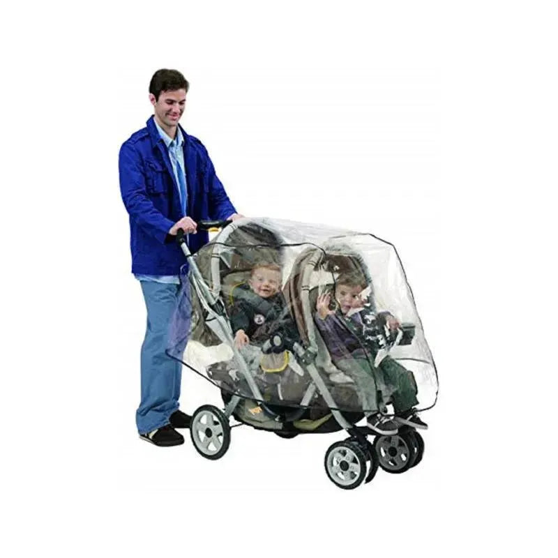 Nuby Weather Shield on a tandem stroller protecting two seated children from the weather, with a man pushing the stroller.
