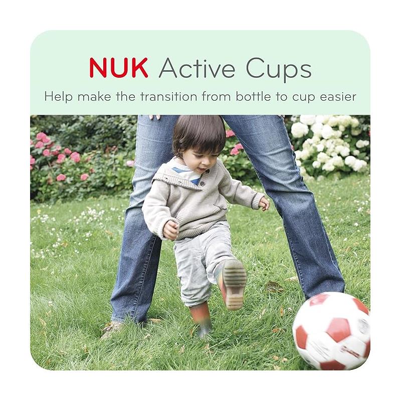 Child playing with a soccer ball in a garden, while an adult stands nearby, promoting NUK Active Cups for easy bottle-to-cup transition.