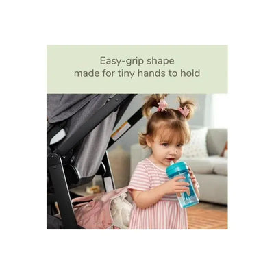 NUK 10 Oz EasyStraw Cup in teal, held by a toddler with playful hair, showcasing an easy-grip design for small hands.
