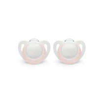 Two pink and white Nuk newborn pacifiers designed for girls, suitable for ages 0-2 months.