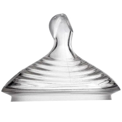 Medium flow baby bottle nipple from NUK, featuring a clear, smooth design with pronounced ridges for easy grip.