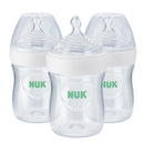 Three NUK Simply Natural 5 oz baby bottles with slow flow nipples, featuring clear plastic with green NUK logo.