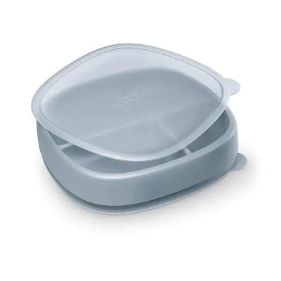 Suction plate and lid by NUK in blue, featuring a divided design for serving different foods.