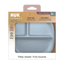 NUK For Nature suction plate in blue, featuring three sections and a lid, promotes mess-free feeding for kids 6 months and older.