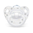 Pacifier with a white and polka dot design, part of the Nuk Simply Natural Baby Bottles Gift Set.