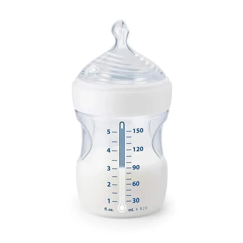 Simply Natural Baby Bottle with measurement markings, white collar, and a clear design, containing white liquid.