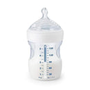 Simply Natural Baby Bottle with measurement markings, white collar, and a clear design, containing white liquid.