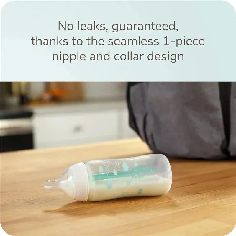 Nuk Smooth Flow Pro Anti-Colic Baby Bottle, 5oz, features a 1-piece nipple design to prevent leaks, with visible milk inside.