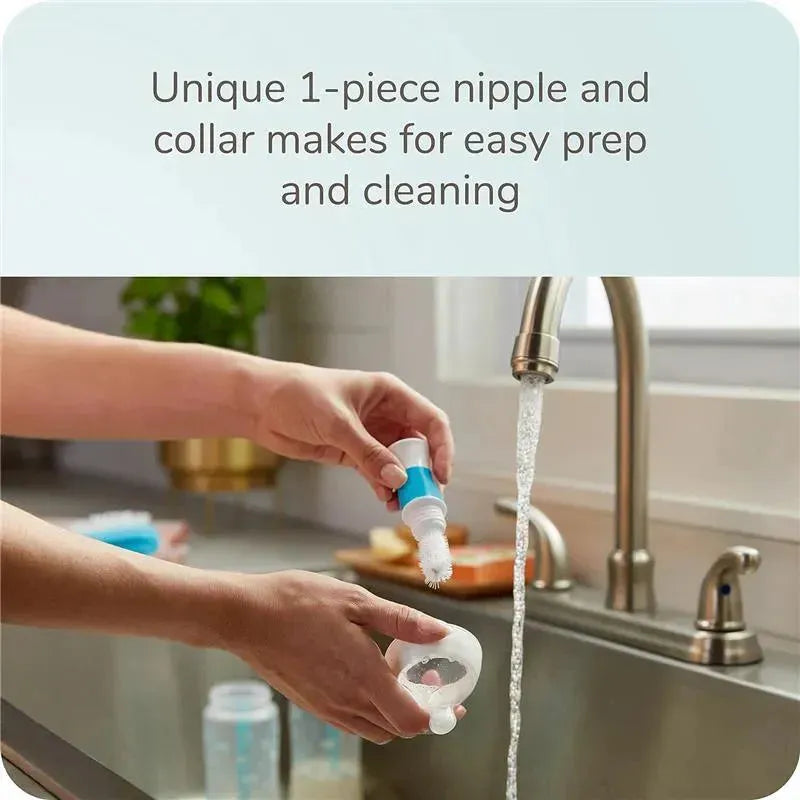 Unique 1-piece nipple and collar for the Nuk Smooth Flow Pro Anti-Colic Baby Bottle shown being cleaned under running water.