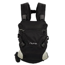 Nuna CUDL™ clik Baby Carrier in Caviar, featuring adjustable straps and a sleek black design, suitable for carrying infants.