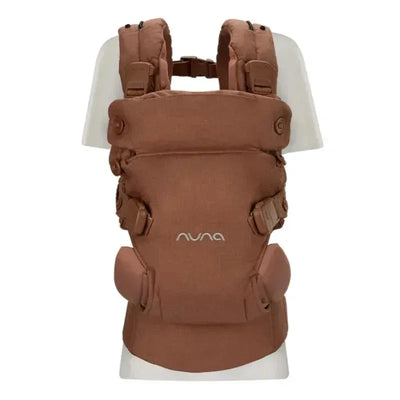 Nuna CUDL™ luxe Baby Carrier in Sienna color, featuring adjustable straps and a structured design for comfort.