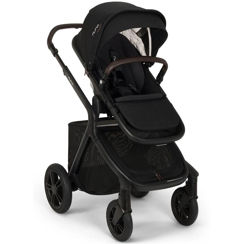 Nuna DEMI™ icon stroller in caviar color with a canopy, adjustable seat, and large storage basket.