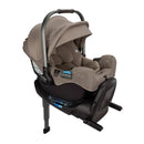 Nuna Flex System Frame with Pipa Rx infant car seat in Cedar color, featuring a padded interior and adjustable handle.
