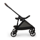 Nuna Flex System Frame in Caviar with PIPA™ Series Adapter, showcasing a sleek black design and mesh storage.