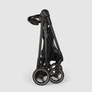 Nuna Flex System Frame in Caviar color, compactly folded, showcasing its sleek design and sturdy wheels.