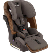 Nuna LUMN Combination Car Seat in Granite, featuring a padded seat, adjustable headrest, and safety harness.