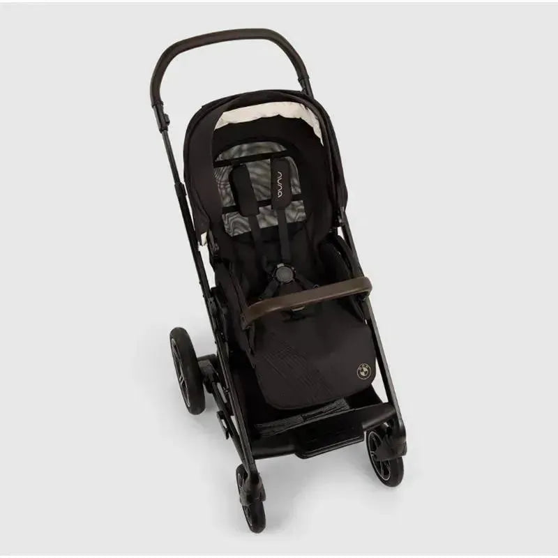 Nuna MIXX™ next stroller in Element color featuring a magnetic buckle, with a sleek design and comfortable seating.