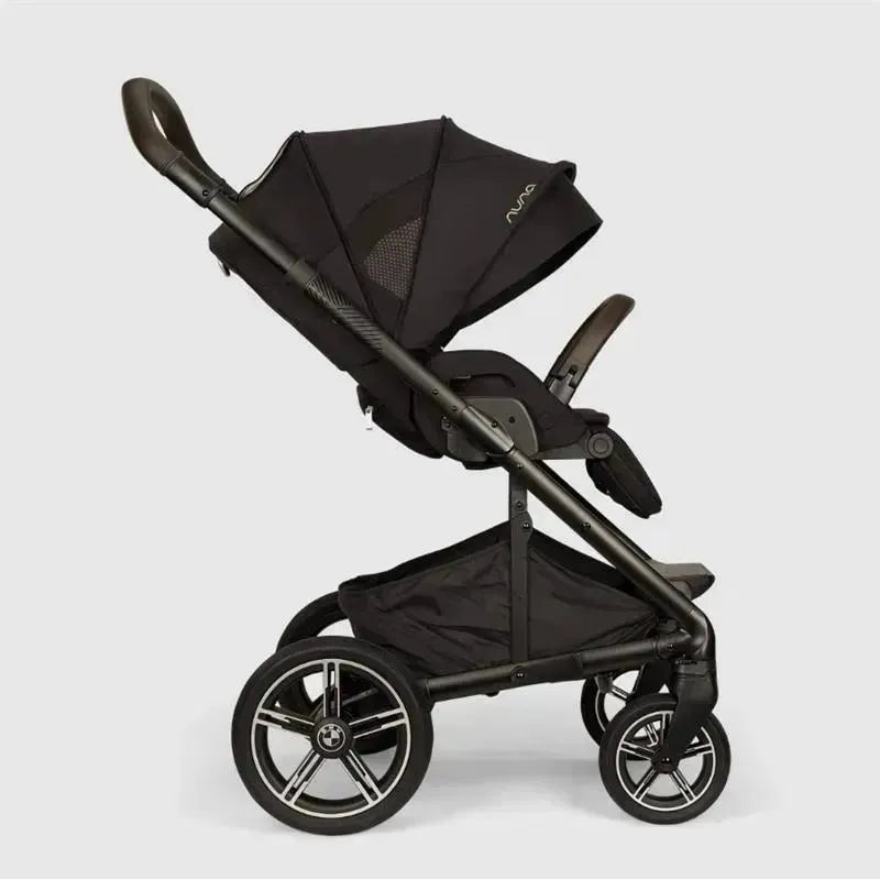 Nuna MIXX™ next stroller in black, featuring a magnetic buckle, adjustable seat, and stylish wheels.