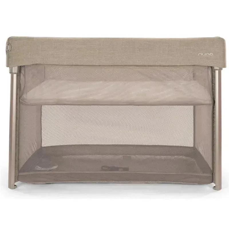 Nuna Paal Playard in Cedar color, featuring a mesh design and two levels for safe play and rest for infants.