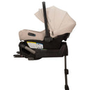 Nuna PIPA™ aire Infant Car Seat in Biscotti color with adjustable canopy and secure base for safety.