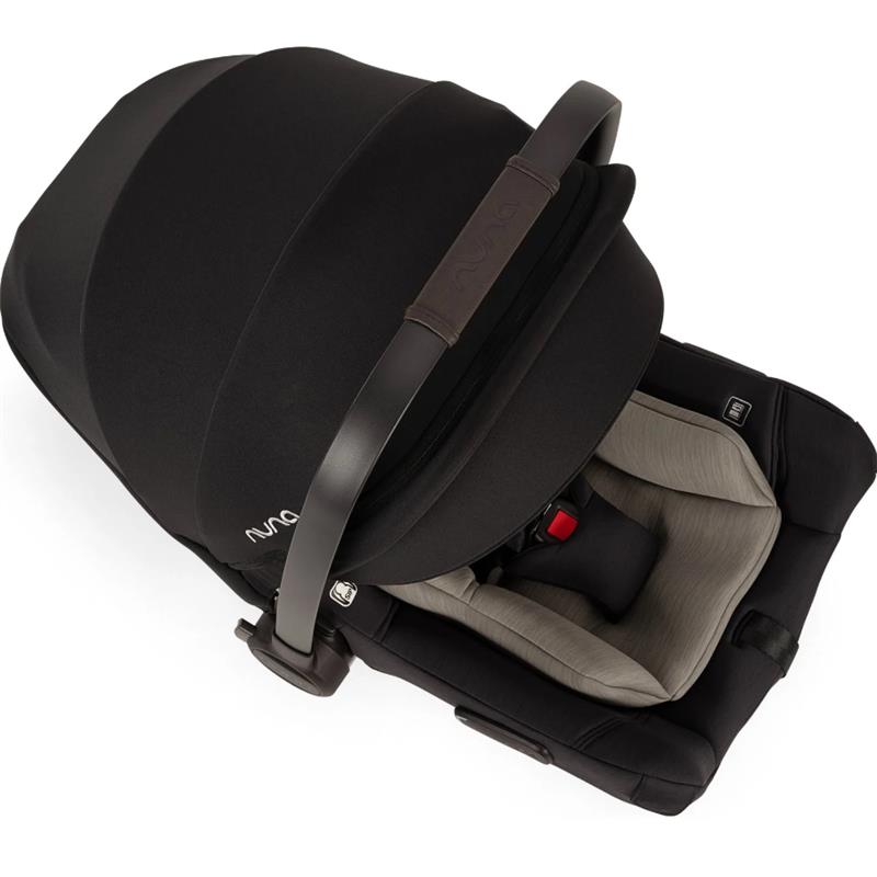Nuna PIPA™ aire Infant Car Seat in Caviar with a removable infant insert and adjustable canopy.