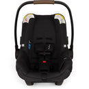 Nuna PIPA™ aire Infant Car Seat in Caviar color, featuring safety labels, adjustable handle, and secure harness system.