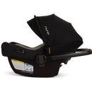 Nuna PIPA™ aire Infant Car Seat in Caviar color, featuring a removable canopy, cushioned seating, and safety labels.
