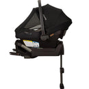 Nuna PIPA™ aire Infant Car Seat in Caviar with a PIPA™ Series Base; features a protective canopy and safety labels.