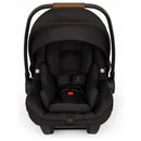 Nuna PIPA™ aire rx Infant Car Seat in Granite color with a tan handle, featuring a padded interior and safety harness.