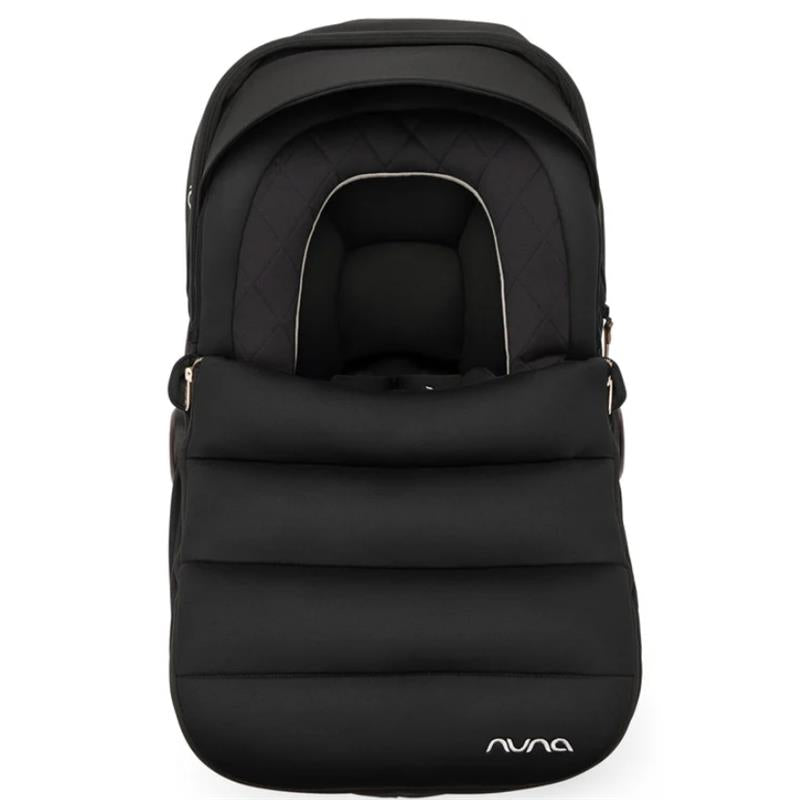 Nuna PIPA™ Series Winter Footmuff in Caviar color, featuring a quilted design and padded comfort for infants.
