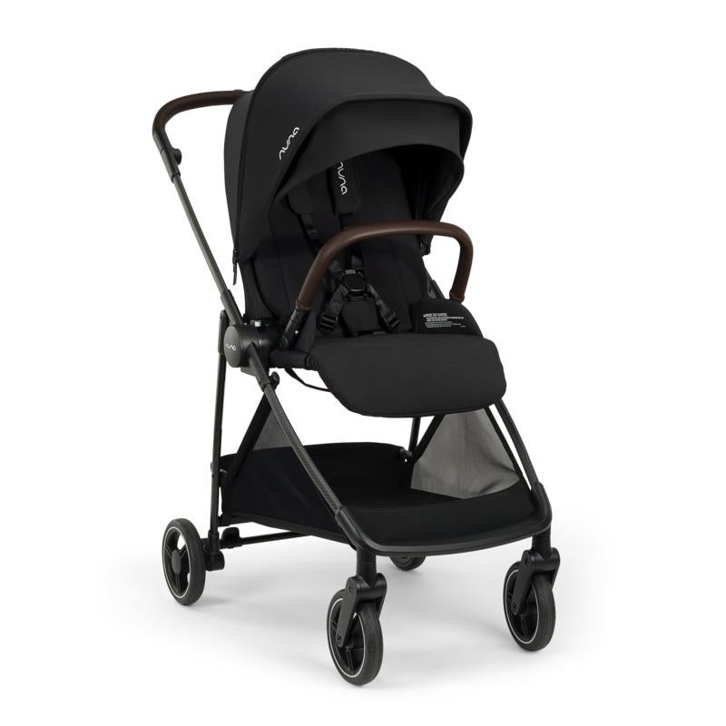 Nuna PIPA urbn Flex System in Caviar color, featuring a sleek black design with a padded seat and adjustable handlebars.