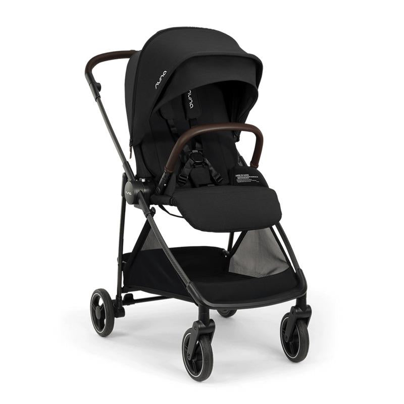 Nuna PIPA™ urbn Flex System™ in Caviar color, showcasing a sleek, modern stroller with brown handlebars and a spacious seating area.