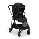 Nuna PIPA™ urbn Flex System™ in Caviar color, showcasing a sleek, modern stroller with brown handlebars and a spacious seating area.