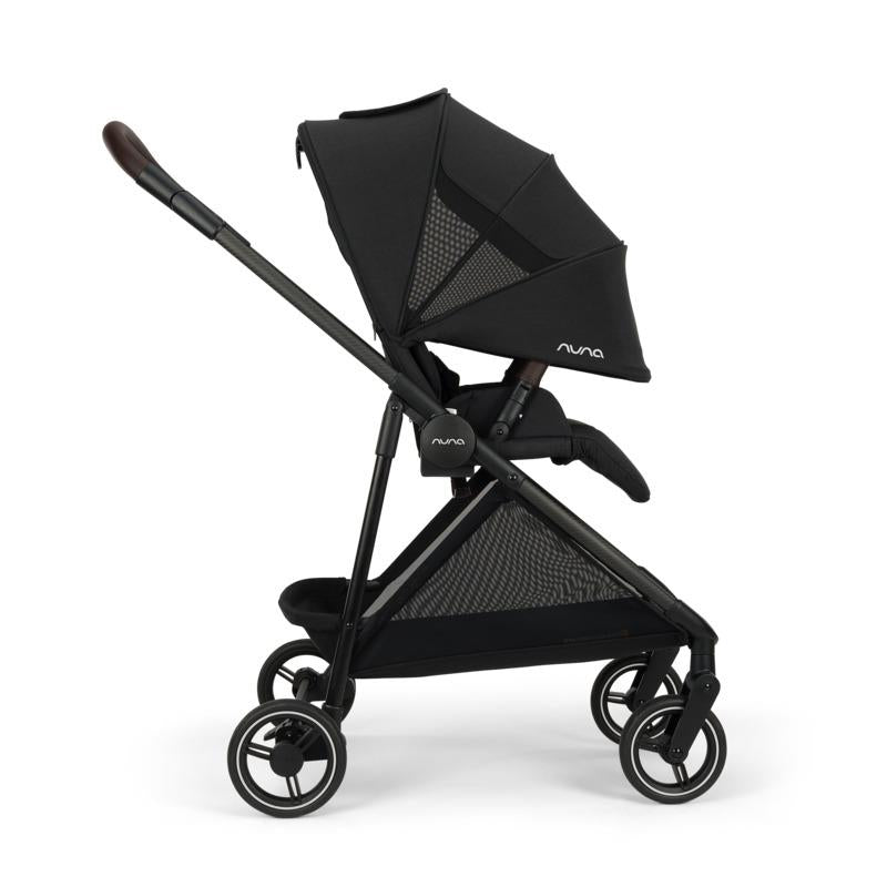 Nuna PIPA™ urbn Flex System™ stroller in Caviar, featuring a black fabric canopy and sleek frame design.