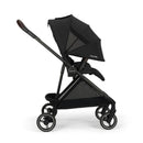 Nuna PIPA™ urbn Flex System™ stroller in Caviar, featuring a black fabric canopy and sleek frame design.