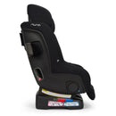 Nuna RAVA™ next Convertible Car Seat in Caviar, featuring adjustable headrest, safety labels, and side vents.