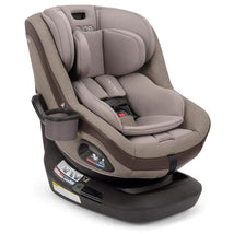 Nuna REVV™ maxx Convertible Car Seat in Cedar color features plush padding, multiple recline positions, and a cup holder.