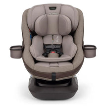 Nuna REVV™ maxx Convertible Car Seat in Cedar color with plush fabric, side cup holders, and adjustable headrest.