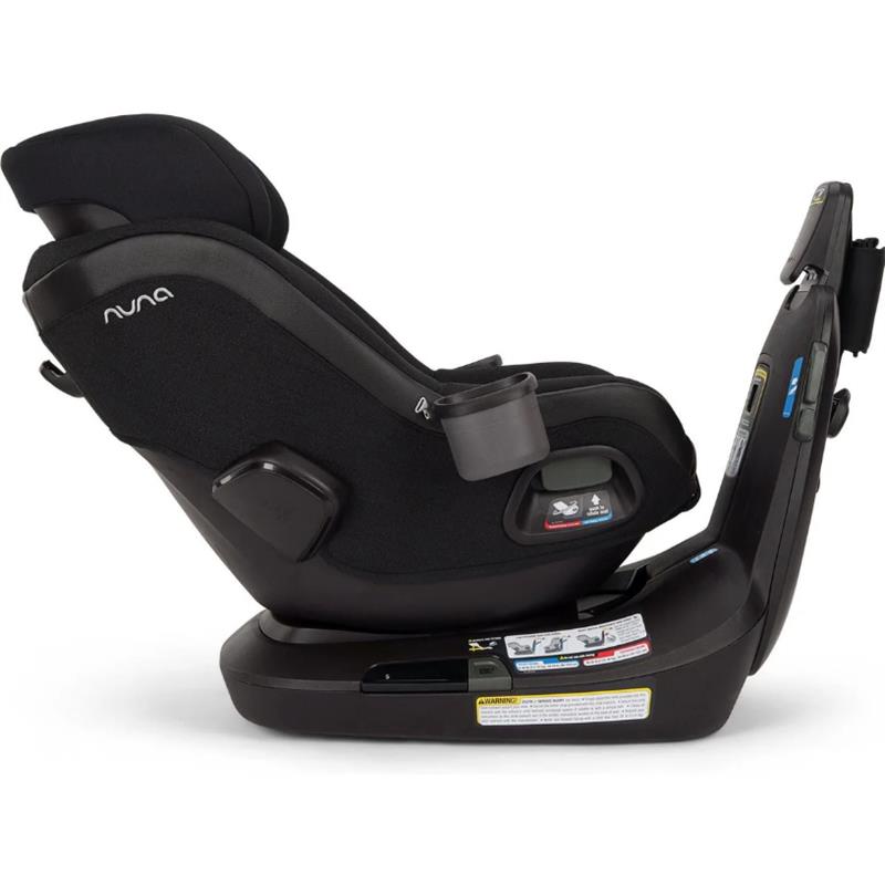 Nuna Revv Maxx Rotating Convertible Car Seat in Midnight, featuring a side view with a cup holder and safety labels.