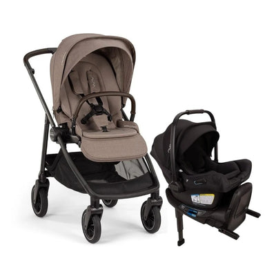 Nuna Swiv stroller in cedar color with a Pipa Aire Rx car seat in caviar color, both designed for travel convenience.